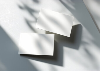 Two business cards in a white interior with shadows Mockup. Generative ai