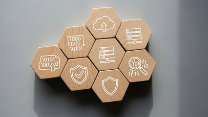 Wooden hexagons with white digital security icons and symbols on gray background