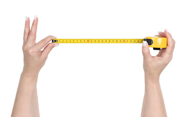 Woman hands holding a yellow measuring tape, isolated object with transparent background PNG, accurate measuring tool for DIY, construction, home renovation or sewing projects