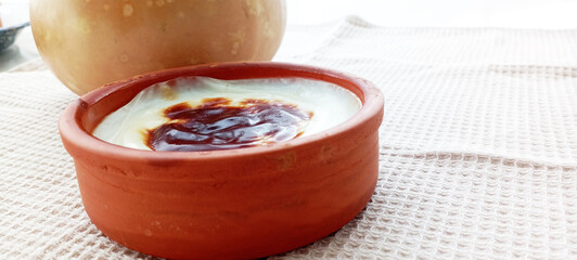Traditional turkish dessert bakery rice pudding Turkish name Fırın Sutlac in glass bowl