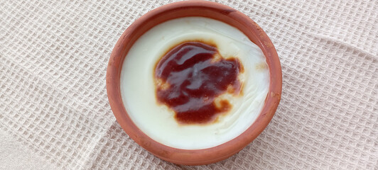 Traditional turkish dessert bakery rice pudding Turkish name Fırın Sutlac in glass bowl