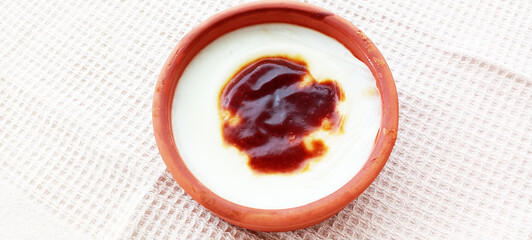 Traditional turkish dessert bakery rice pudding Turkish name Fırın Sutlac in glass bowl