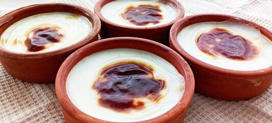 Traditional turkish dessert bakery rice pudding Turkish name Fırın Sutlac in glass bowl
