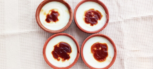Traditional turkish dessert bakery rice pudding Turkish name Fırın Sutlac in glass bowl