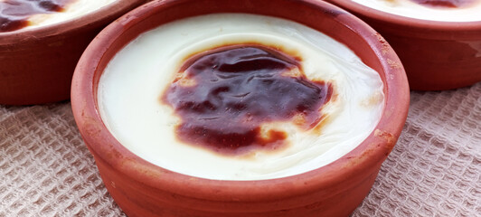 Traditional turkish dessert bakery rice pudding Turkish name Fırın Sutlac in glass bowl