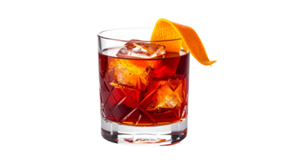 A classic cocktail with ice cubes, orange peel garnish, in a cut-glass tumbler