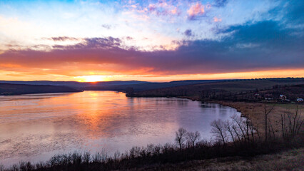 Aerial view over Dumbrava Lake in Iași, Romania, at sunset
