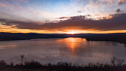 Aerial view over Dumbrava Lake in Iași, Romania, at sunset