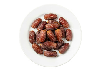 dried dates on white plate close up still life