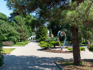Fototapeta premium August 19, 2025 The promenade along Lake Abrau-Dyurso with calm water, greenery, and scenic surroundings