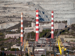 August 22 2025 View of Novorossiysk port Russia with cargo ships and cranes on the coastline. Industrial maritime scene on the Black Sea