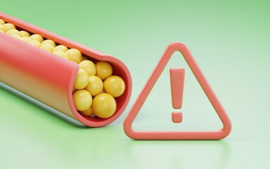 Warning sign adjacent to a tube filled with yellow spherical objects on a green surface