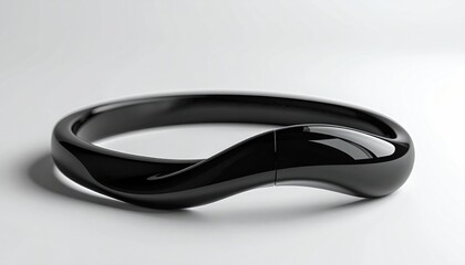 Elegant Black Snake-Shaped Bracelet on White Background.