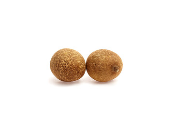 Fototapeta premium Longan tropical fruit, featuring two round brown fruits with textured skin, displayed on a clean white background, highlighting natural freshness and exotic appeal