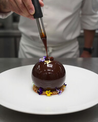 Molecular Gastronomy Chocolate Sphere Dessert with Gold Leaf - Fine Dining Innovation