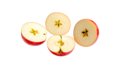Four slices of red apple with yellow core, arranged on a black background