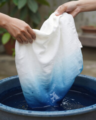 Textile Artist Dipping Fabric in Indigo Dye Vat - Sustainable Fashion
