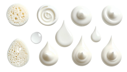 Collection of creamy white swirls, droplets, and textures on a black background