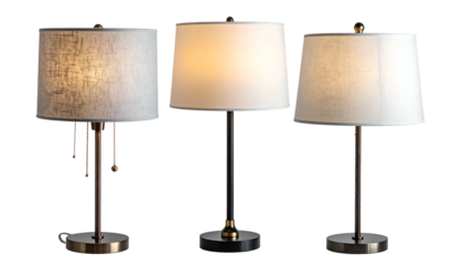 Three table lamps with white shades and brass bases against a black background