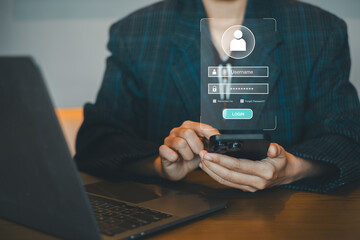 A business professional interacts with a smartphone, showcasing a secure login holographic interface in a modern office environment.