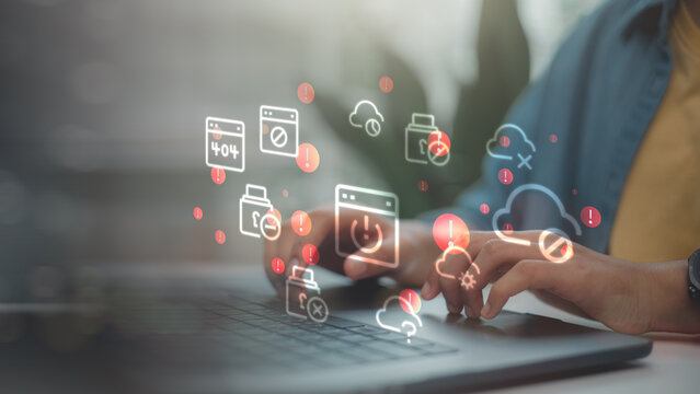 Businessman using laptop with 404 error and system failure icons. Server down, internet connection lost and website maintenance concept. Cyber security technology problem. - Powered by Adobe