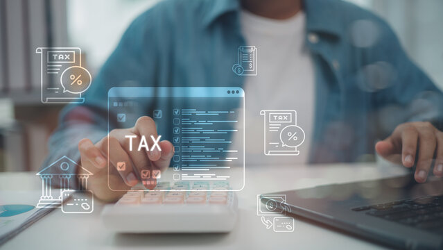 Business person hand using calculator with virtual tax interface. Concept of income tax return, financial accounting, government vat payment, and corporate budget planning strategy.