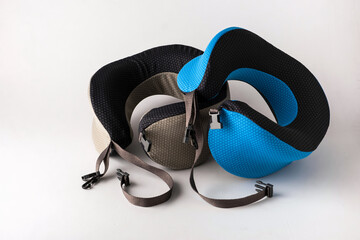 Ergonomic travel neck pillows in various colors, designed for comfort and support, featuring soft textures and adjustable straps for enhanced relaxation during journeys