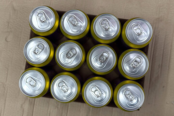 Drink can arranged neatly in a cardboard box ready for distribution