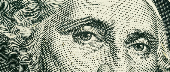 Macro detail of a historical portrait's eyes on a paper currency bill, showcasing the intricate engraving style, fine lines, and cross-hatching texture of the banknote