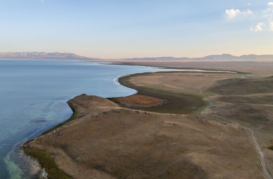 Aerial view, Vast empty landscape at the mountain lake Song Kul, Moldo Too Mountains, Naryn region, Kyrgyzstan