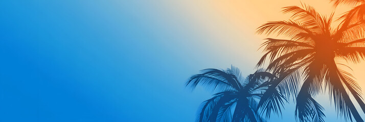 breathtaking tropical sunset - with the silhouette of palm trees against the vibrant colors of the twilight sky wide banner 