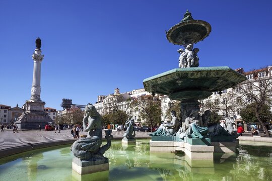 Fountain, bronze fountain with monument to Dom Pedro IV, Rossio Square, Lisbon, Portugal