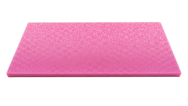 Bright pink rectangular foam sheet with glitter texture on black background image - Powered by Adobe