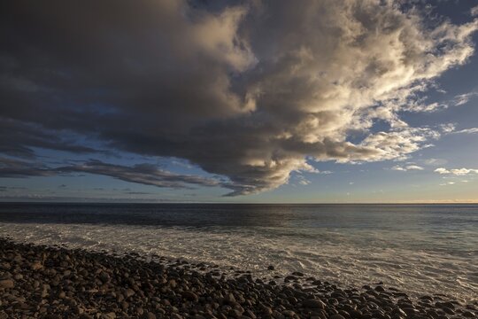 Sea and dramatic cloud atmosphere, evening light, Paul do Mar, Madeira, Portugal