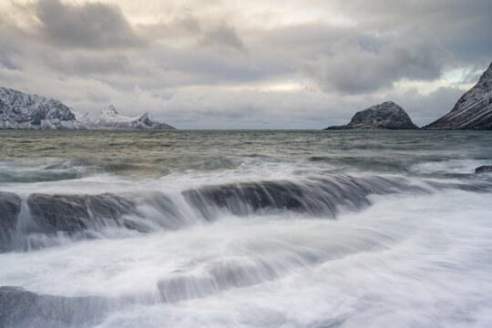 Coast with islands and mountains, Haukland beach, Vestv&aring;g&oslash;ya, Lofoten, Norway