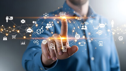 Man's Hand Touching Futuristic Digital Interface with Interconnected Global Network and Business Icons