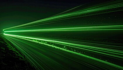 Long exposure shot of illuminated vehicle trails on a winding road at night (2)