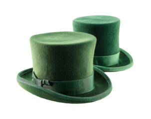 Two vintage green top hats with ribbons on a black background
