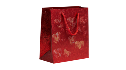 Red gift bag with golden heart pattern isolated on transparent background suitable for valentines day gifts and special occasion presents