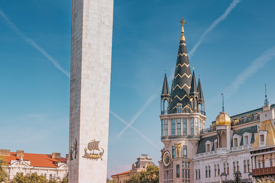 6 November 2025, Batumi, Georgia: Europe Square featuring the Astronomical Clock tower on the former National Bank building and a nearby monument