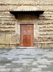 Old wooden door in the medieval city of Sibenik, Croatia