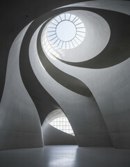 Architectural marvel showcasing spiraling interior design with skylight illuminating the structure