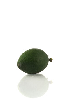 Feijoa fruit over white background with some reflection on the surface