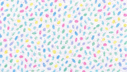 Colorful abstract pattern of scattered dots and splashes on a white surface