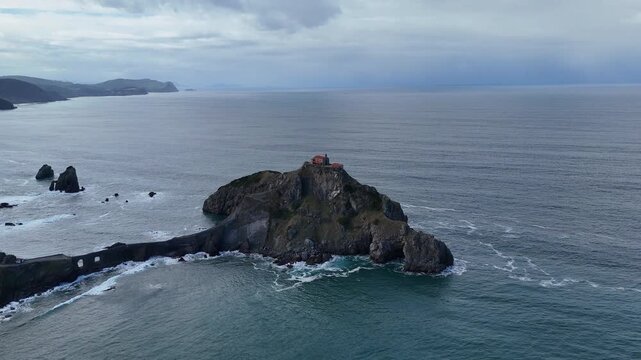 Dramatic Aerial Footage Gaztelugatxe Rocky Island with Waves Crashing