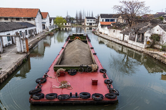 Traditional Cargo Barge on Historic Canal, Suzhou Old Town