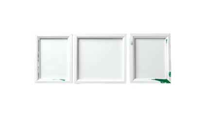 Three white picture frames on a black background, slight green paint residue