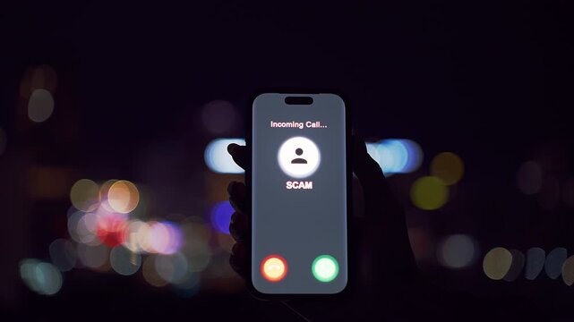 Smartphone Showing Incoming Scam Call Held Against Blurred Night City Lights in a Close Angle Dark View Illustrating Fraud Alert Moment
