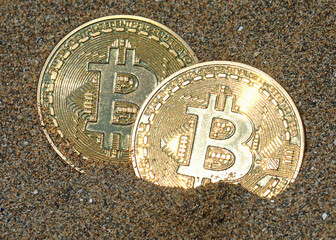 two golden coins with b letter symbol cryptocurrency called bitcoin
