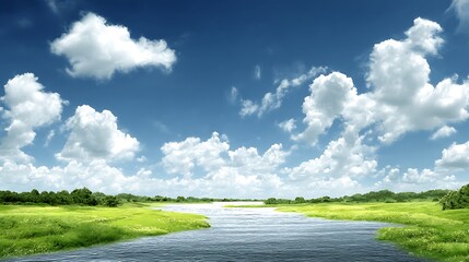 A winding river flowing through vibrant green fields under a bright blue, cloudy sky